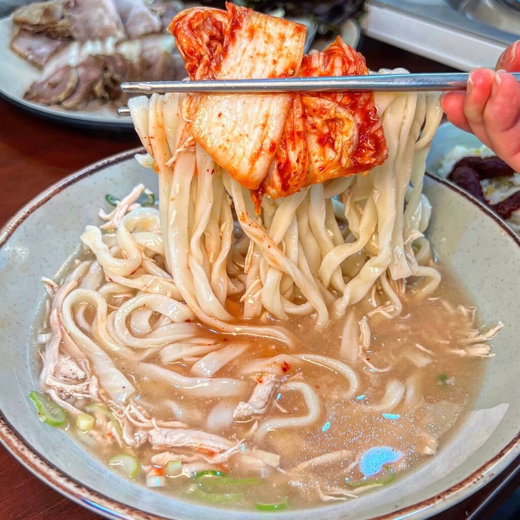 Bowl of Korean knife-cut noodle soup at a local restaurant in Seoul