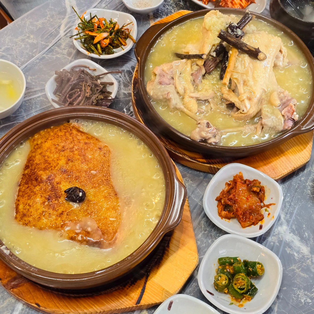 Best samgyetang in Seoul with whole ginseng chicken soup, rice, kimchi, and Korean side dishes