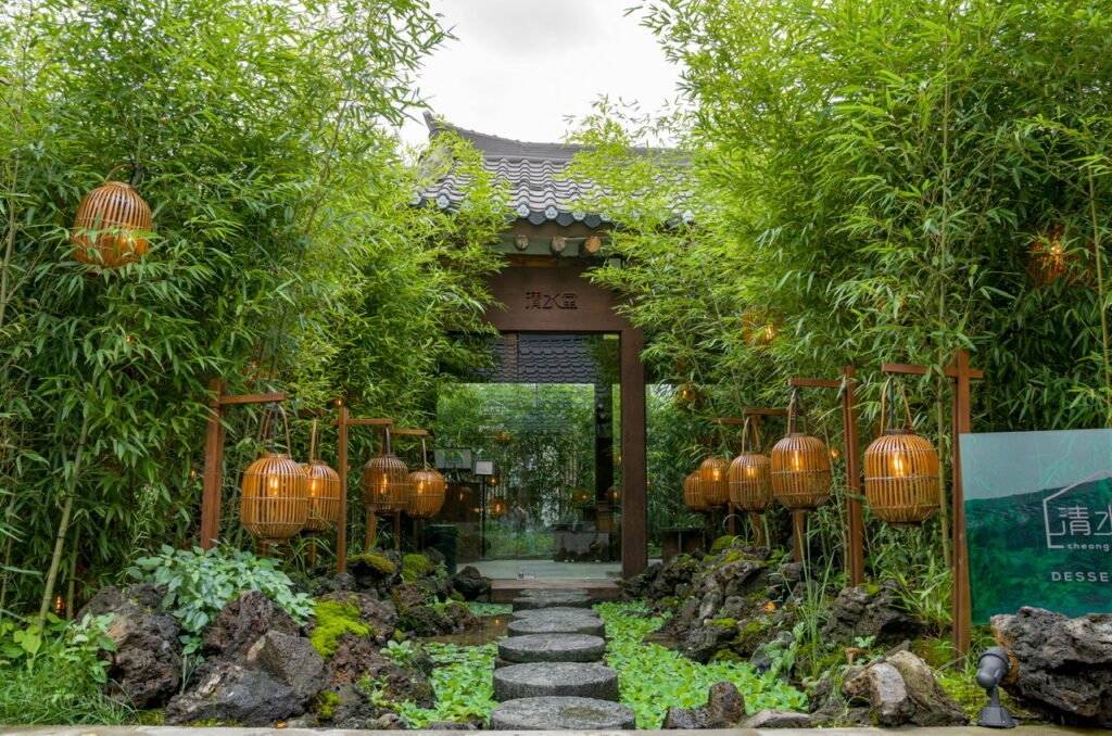 Bamboo garden and stone path at Cheongsudang Bakery in Ikseondong