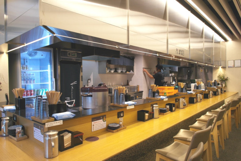 Counter seating at a solo-friendly restaurant in Seoul