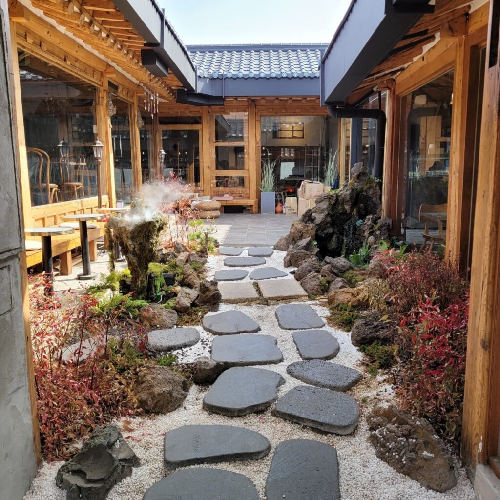 Relaxed hanok cafe seating at Hanok Langsom Ikseon in Seoul