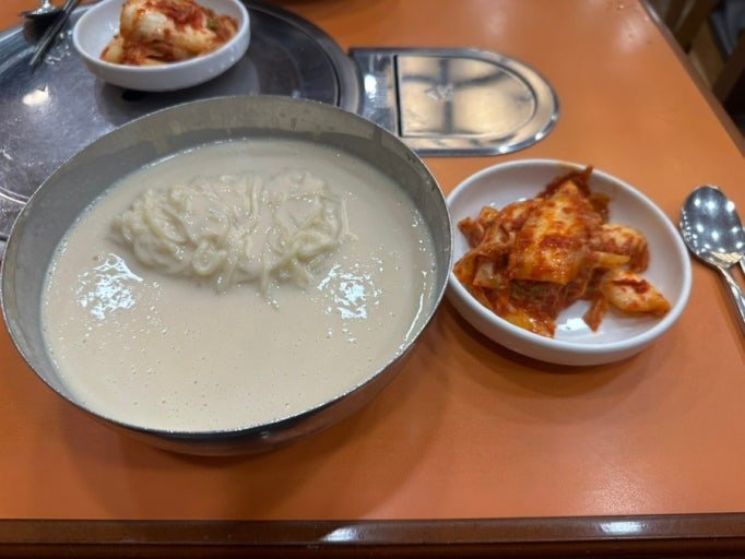 Cold kongguksu noodles with kimchi at Jinju Hoegwan in Seoul