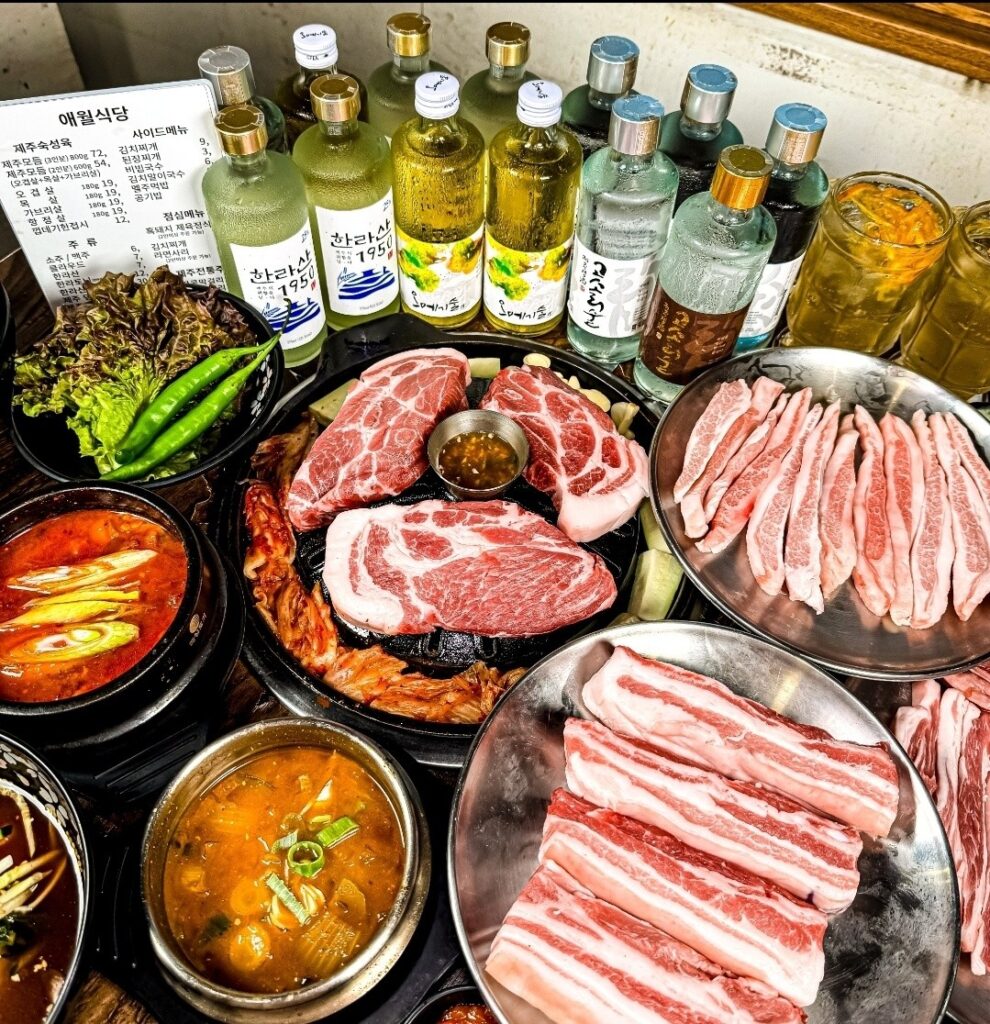 Korean BBQ table with grilled meat and side dishes in Seoul