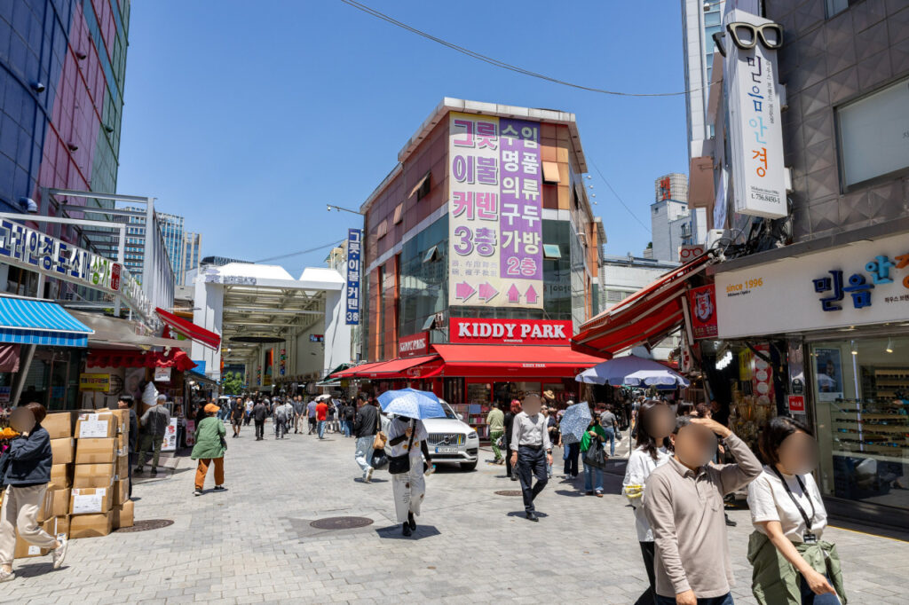 Namdaemun Market food street in Seoul with local shops and visitors