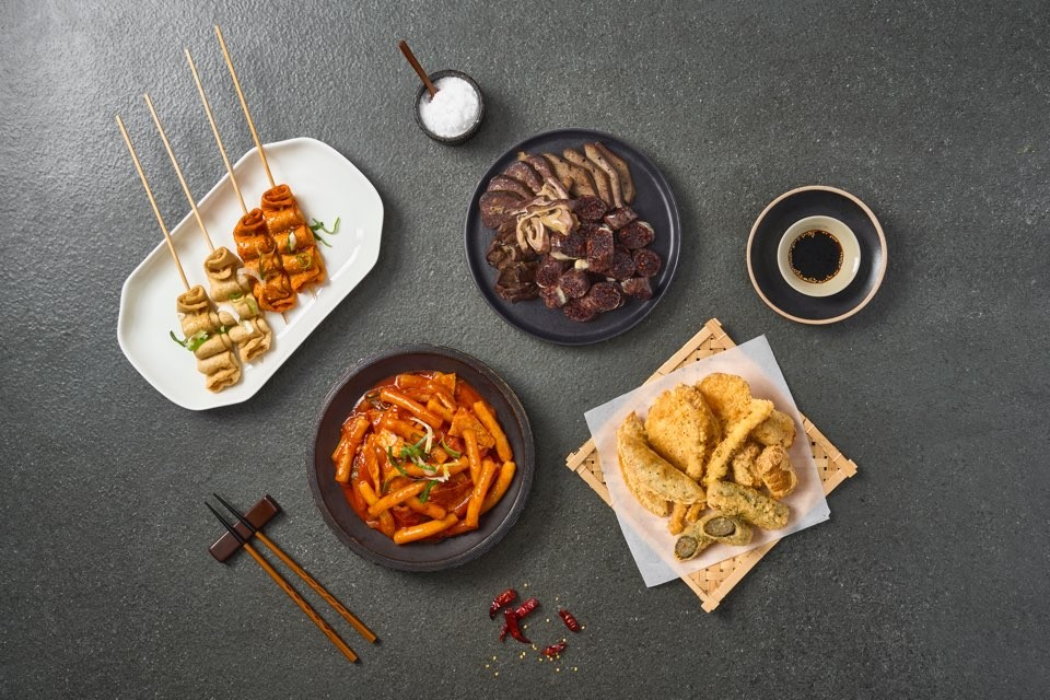 Tteokbokki with fried snacks, fish cake soup, and boiled egg