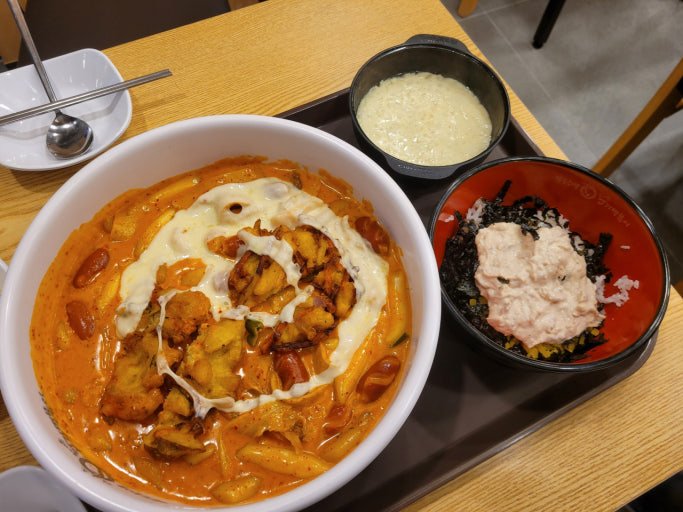 Dongdaemun Yupdduk with spicy tteokbokki and toppings in Seoul