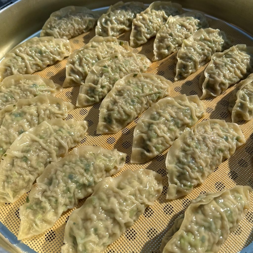 Handmade pork and kimchi mandu at Jinseong Mandu in Mangwon Market