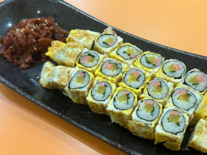 Egg-rolled gimbap at Jinsunja Gimbap in Bongcheon Seoul