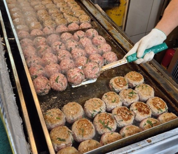 Grilled tteokgalbi at Mangwon Market in Seoul