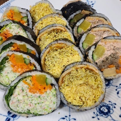 Bapdoduk Gimbap packed with egg and fish cake at Owol-ui Gimbap in Seoul